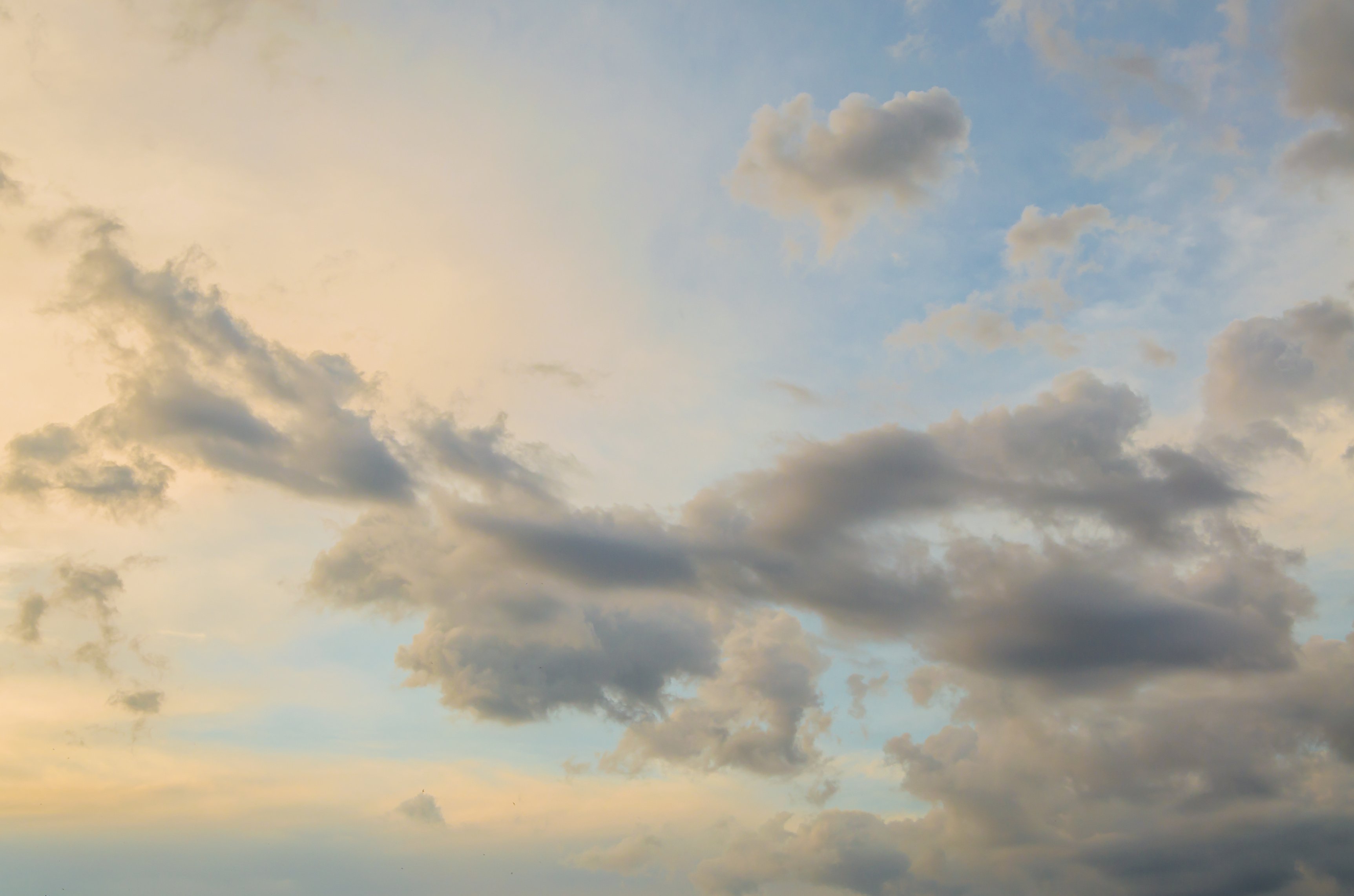 Sky with clouds at different times of the day